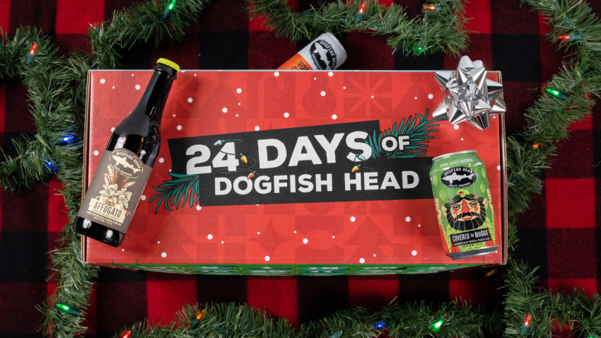 24 Days of Dogfish 24-day exploration package set on a red back drop with Dogfish head product around it 